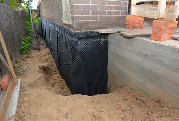 Happy homeowners after waterproofing job in Mowrystown